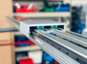 What is the difference between static and dynamic load capacity for linear rails?